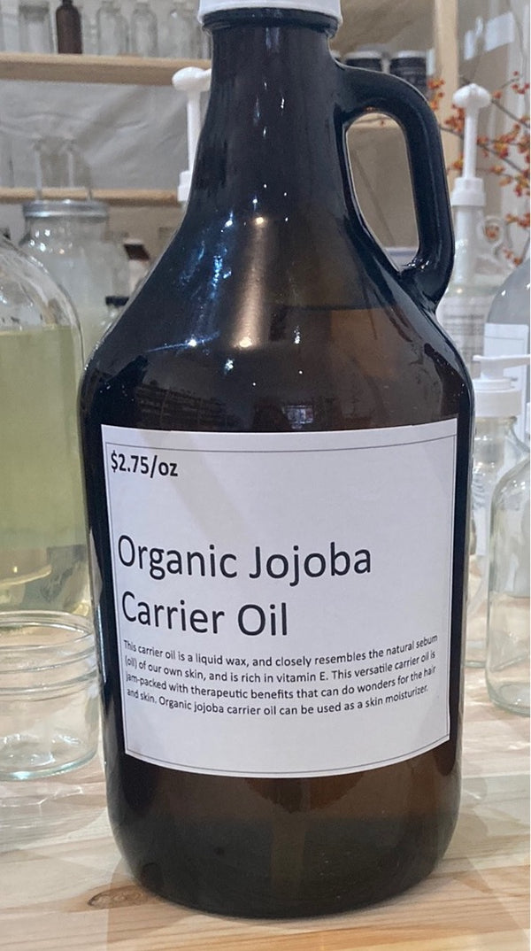 100% jojoba oil in glass bottle refillable